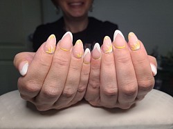 Yellow nail art.